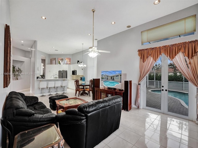 4985 NW 120th Ave, Coral Springs, FL 33076 - living room with recessed lighting, french doors, a ceiling fan, light tile patterned flooring, and baseboards