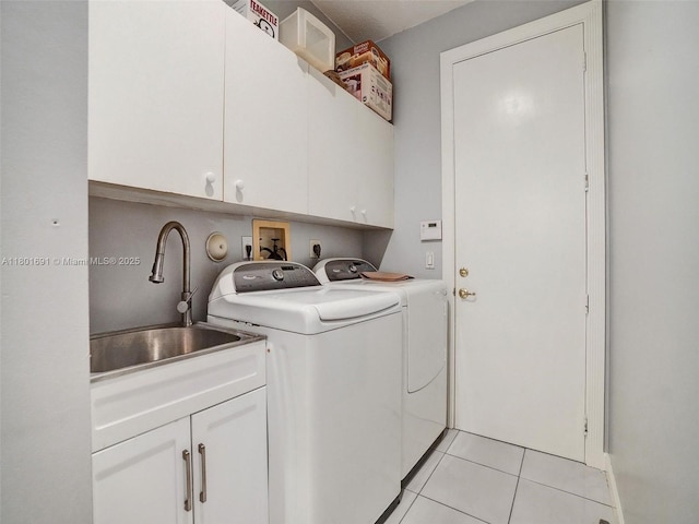 4985 NW 120th Ave, Coral Springs, FL 33076 - laundry area featuring washing machine and clothes dryer, cabinet space, and light tile patterned floors