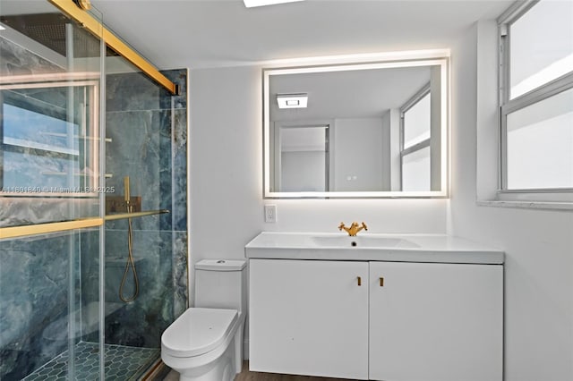 137 Golden Isles Dr Unit 305, Hallandale Beach, FL 33009 - bathroom with a marble finish shower, toilet, and vanity