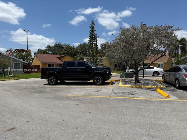 1751 SW 87th Ter, Miramar, FL 33025 - uncovered parking lot with a residential view
