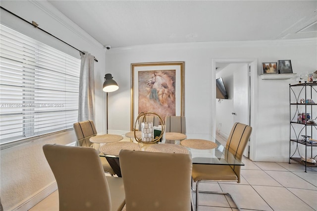 6400 Sheridan St, Hollywood, FL 33024 - dining room featuring light tile patterned floors, baseboards, and ornamental molding