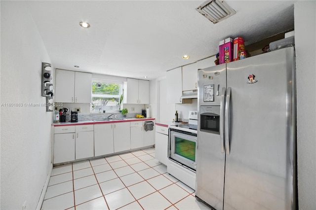 6400 Sheridan St, Hollywood, FL 33024 - kitchen with stainless steel fridge with ice dispenser, white electric range oven, white cabinetry, a sink, and under cabinet range hood