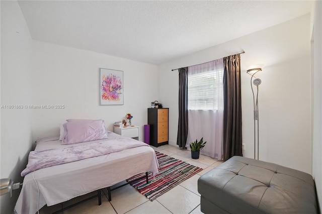 6400 Sheridan St, Hollywood, FL 33024 - bedroom with light tile patterned floors