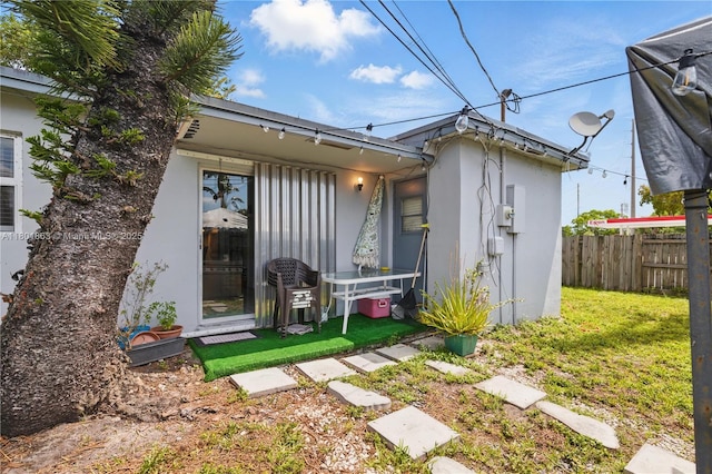 6400 Sheridan St, Hollywood, FL 33024 - back of house featuring stucco siding