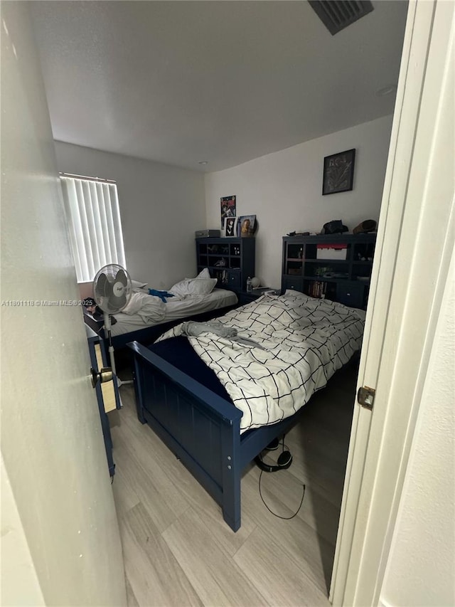 8098 NW 99th Ter, Hialeah Gardens, FL 33016 - bedroom with wood finished floors