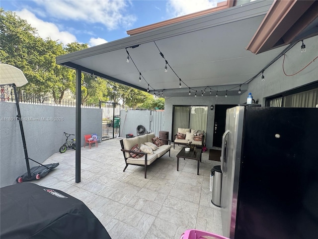 8098 NW 99th Ter, Hialeah Gardens, FL 33016 - view of patio with an outdoor hangout area, fence, and a gate