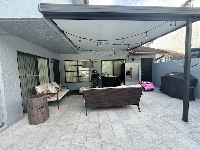 8098 NW 99th Ter, Hialeah Gardens, FL 33016 - view of patio with outdoor lounge area and grilling area