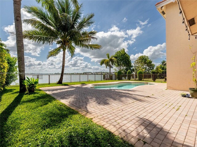 5087 SW 183rd Ave, Miramar, FL 33029 - view of pool featuring a patio area and a water view