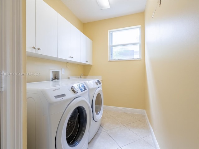 5087 SW 183rd Ave, Miramar, FL 33029 - laundry room with independent washer and dryer, cabinet space, baseboards, and light tile patterned floors