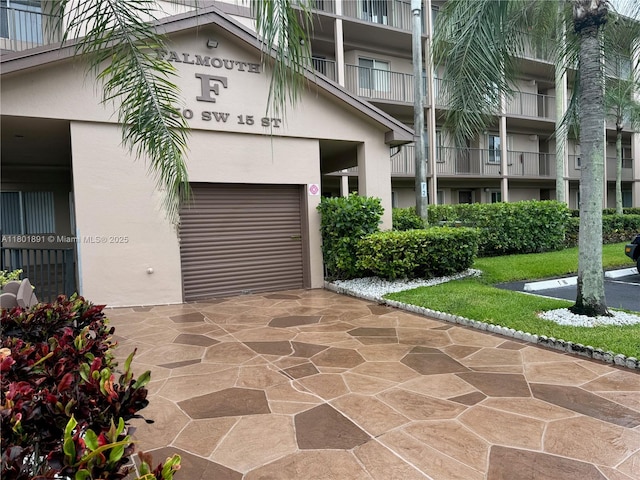 view of property featuring an attached garage