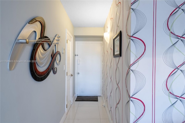 16900 NE 14th Ave Unit 201, North Miami Beach, FL 33162 - hallway featuring light tile patterned floors