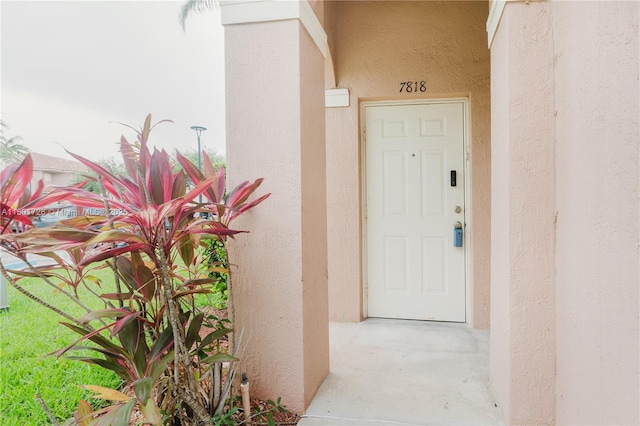 7818 Catalina Cir, Tamarac, FL 33321 - property entrance featuring stucco siding