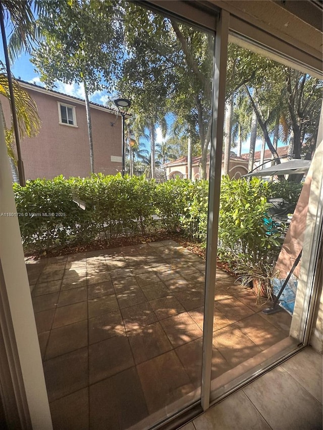 7818 Catalina Cir, Tamarac, FL 33321 - doorway featuring tile patterned flooring