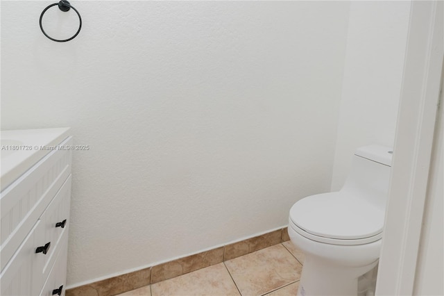 7818 Catalina Cir, Tamarac, FL 33321 - bathroom with vanity, toilet, baseboards, and tile patterned flooring