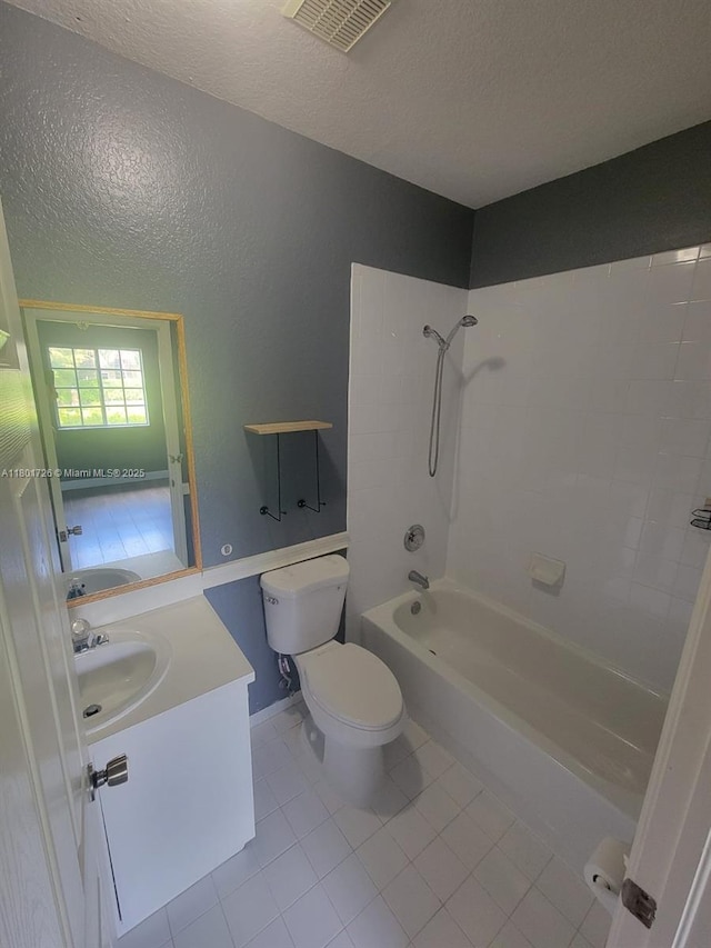 7818 Catalina Cir, Tamarac, FL 33321 - bathroom featuring a textured ceiling, toilet, tile patterned floors, bathtub / shower combination, and vanity