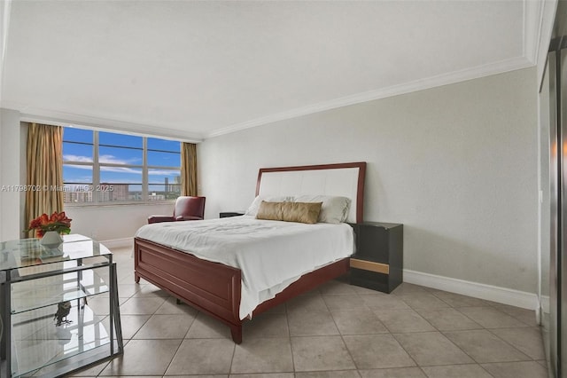 137 Golden Isles Dr Unit 1105, Hallandale Beach, FL 33009 - bedroom featuring crown molding, baseboards, and light tile patterned floors