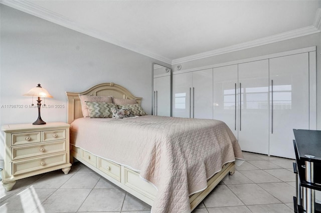 137 Golden Isles Dr Unit 1105, Hallandale Beach, FL 33009 - bedroom featuring crown molding and light tile patterned floors