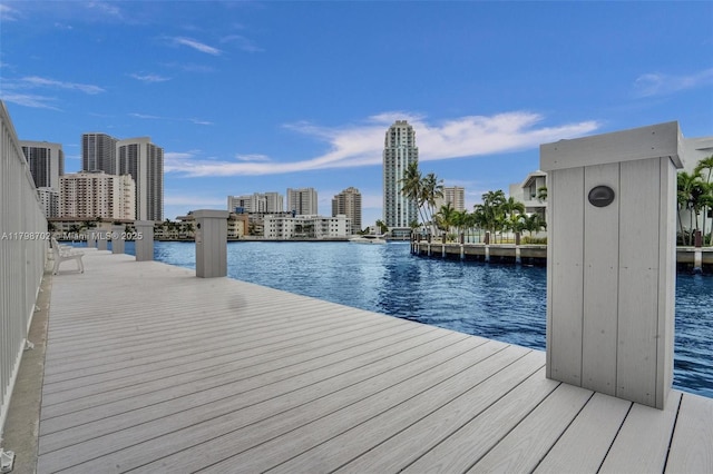 137 Golden Isles Dr Unit 1105, Hallandale Beach, FL 33009 - dock featuring a water view and a city view