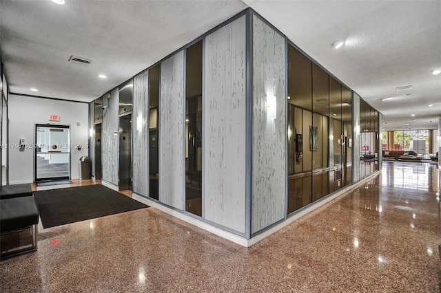 137 Golden Isles Dr Unit 1105, Hallandale Beach, FL 33009 - lobby with a textured ceiling and recessed lighting