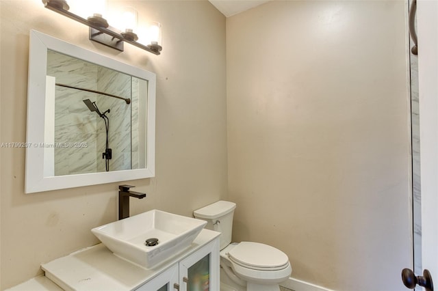 2301 NW 96th Ter Unit 16C, Pembroke Pines, FL 33024 - full bathroom with toilet, a shower, vanity, and baseboards