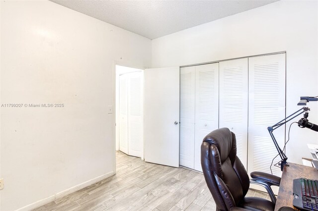 2301 NW 96th Ter Unit 16C, Pembroke Pines, FL 33024 - office area with light wood-style floors