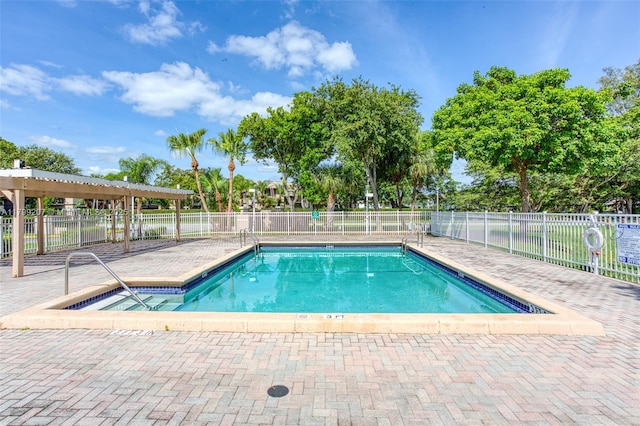 2301 NW 96th Ter Unit 16C, Pembroke Pines, FL 33024 - community pool featuring fence