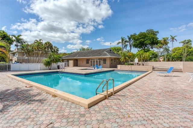 2301 NW 96th Ter Unit 16C, Pembroke Pines, FL 33024 - community pool featuring a patio area and fence
