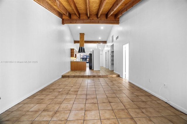 10300 Laurel Ct, Pembroke Pines, FL 33026 - unfurnished living room with beamed ceiling, light tile patterned floors, baseboards, and recessed lighting