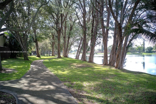 10300 Laurel Ct, Pembroke Pines, FL 33026 - view of property's community with a water view and a lawn