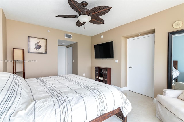16699 Collins Ave Unit 3401, Sunny Isles Beach, FL 33160 - bedroom featuring ceiling fan and light tile patterned flooring