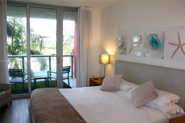 2602 E Hallandale Beach Blvd Unit R408, Hallandale Beach, FL 33009 - bedroom with access to exterior and wood finished floors