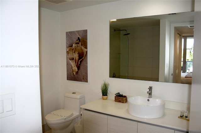 2602 E Hallandale Beach Blvd Unit R408, Hallandale Beach, FL 33009 - bathroom with toilet, vanity, and a shower
