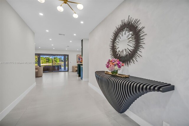 4430 Casper Ct, Hollywood, FL 33021 - corridor with a chandelier, baseboards, recessed lighting, and finished concrete floors