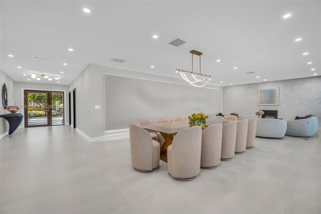 4430 Casper Ct, Hollywood, FL 33021 - dining room with recessed lighting, finished concrete flooring, and baseboards
