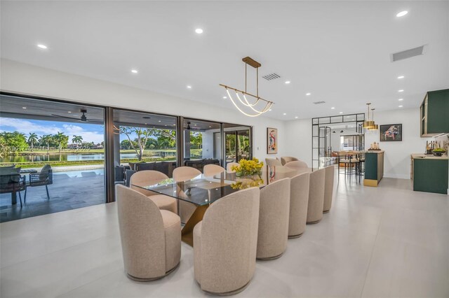 4430 Casper Ct, Hollywood, FL 33021 - dining room with recessed lighting, healthy amount of natural light, baseboards, and a water view