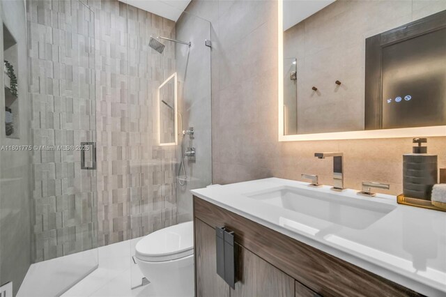 4430 Casper Ct, Hollywood, FL 33021 - full bath with tile walls, a stall shower, vanity, and toilet