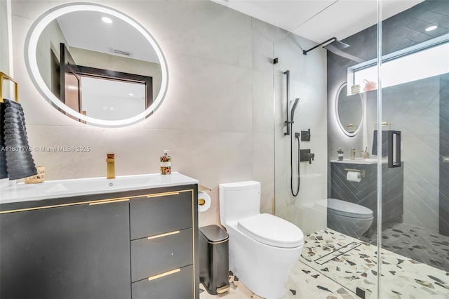 4430 Casper Ct, Hollywood, FL 33021 - bathroom featuring toilet, tile walls, a stall shower, vanity, and tile patterned flooring