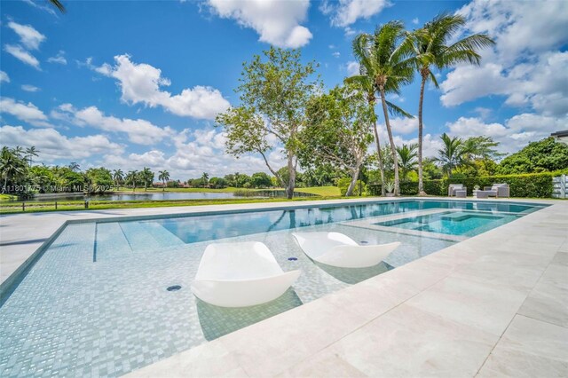 4430 Casper Ct, Hollywood, FL 33021 - view of swimming pool with a patio and a pool with connected hot tub