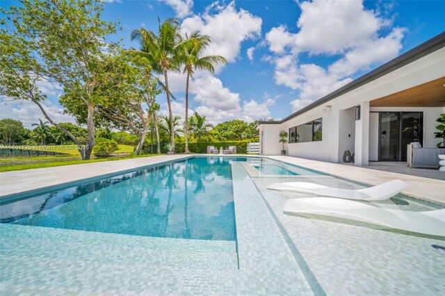 4430 Casper Ct, Hollywood, FL 33021 - swimming pool with a patio area