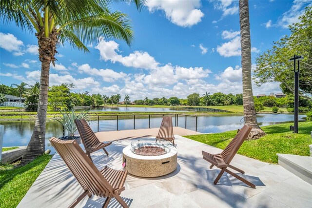 4430 Casper Ct, Hollywood, FL 33021 - view of patio / terrace featuring a fire pit and a water view