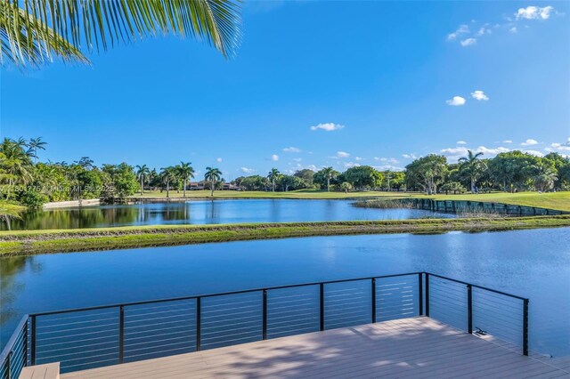 4430 Casper Ct, Hollywood, FL 33021 - dock area with a water view and view of scattered trees
