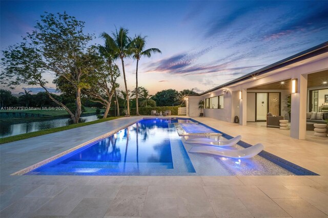 4430 Casper Ct, Hollywood, FL 33021 - outdoor pool with a patio area and an outdoor living space