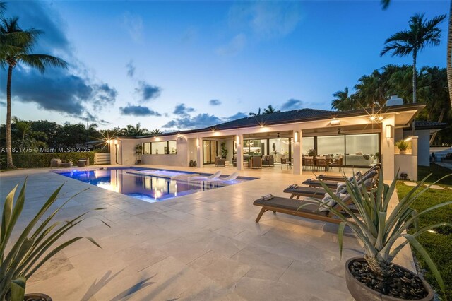 4430 Casper Ct, Hollywood, FL 33021 - swimming pool featuring a jacuzzi and a patio area
