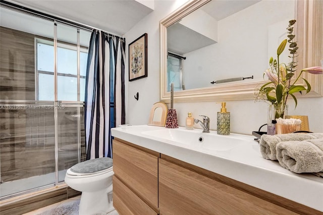 8504 Old Country Mnr Unit 205, Davie, FL 33328 - bathroom with toilet, a stall shower, and vanity