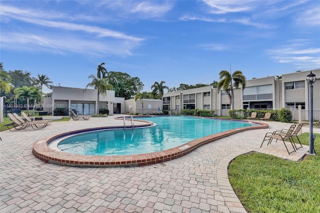 8504 Old Country Mnr Unit 205, Davie, FL 33328 - community pool with a patio and fence