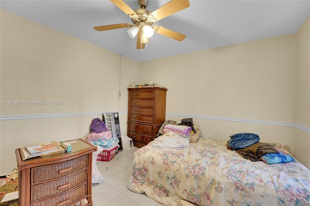 1458 N Lawnwood Cir Unit 24, Fort Pierce, FL 34950 - bedroom with light tile patterned floors and a ceiling fan