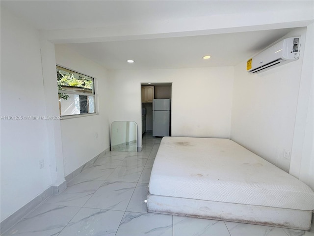 5834 SW 66th St, South Miami, FL 33143 - unfurnished bedroom with freestanding refrigerator, a wall unit AC, light marble finish flooring, recessed lighting, and baseboards