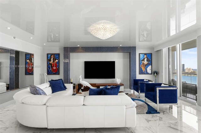 2600 Island Blvd Unit 2603, Aventura, FL 33160 - living room with a high ceiling, marble tiled flooring, a chandelier, and recessed lighting