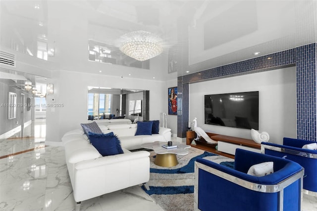 2600 Island Blvd Unit 2603, Aventura, FL 33160 - living area featuring a chandelier, marble tiled floors, a high ceiling, and baseboards