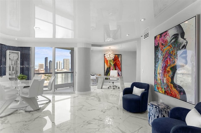 2600 Island Blvd Unit 2603, Aventura, FL 33160 - living room featuring a high ceiling, marble tiled floors, a desk, a view of skyline, and recessed lighting